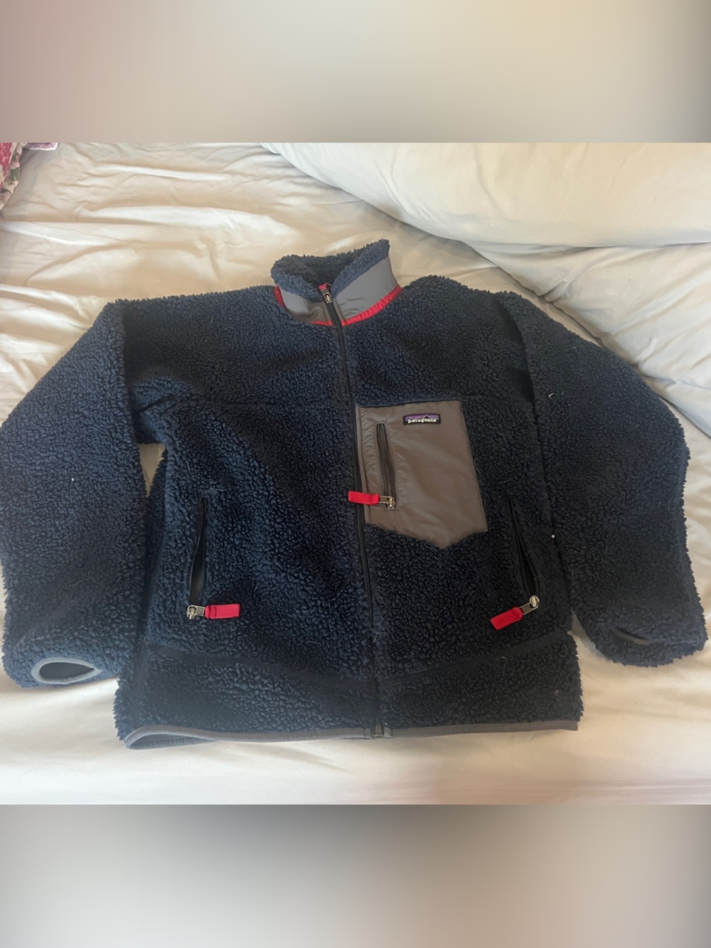 Patagonia Navy Sherpa Fleece Jacket with Gray Pocket and Red Accents
